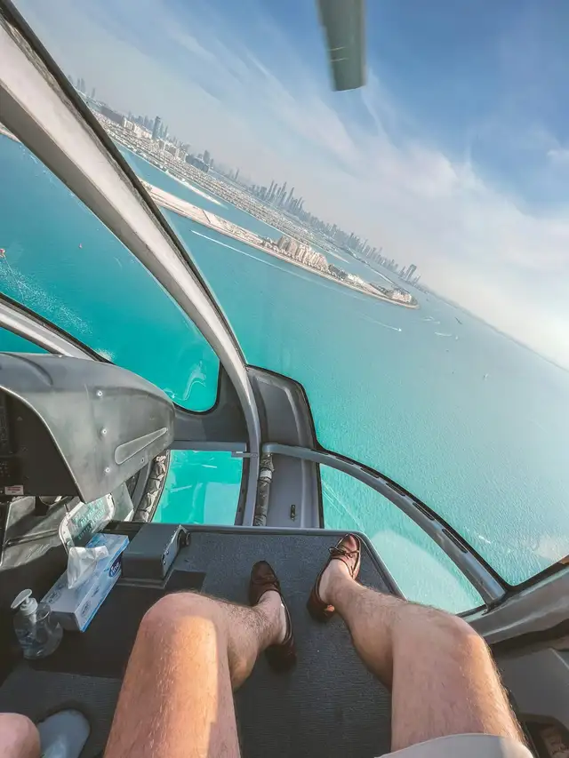 Pilot's view over Palm Jumeirah from the helicopter cockpit