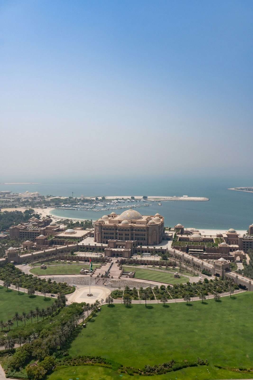 Emirates Palace and the Abu Dhabi coast seen from a helicopter
