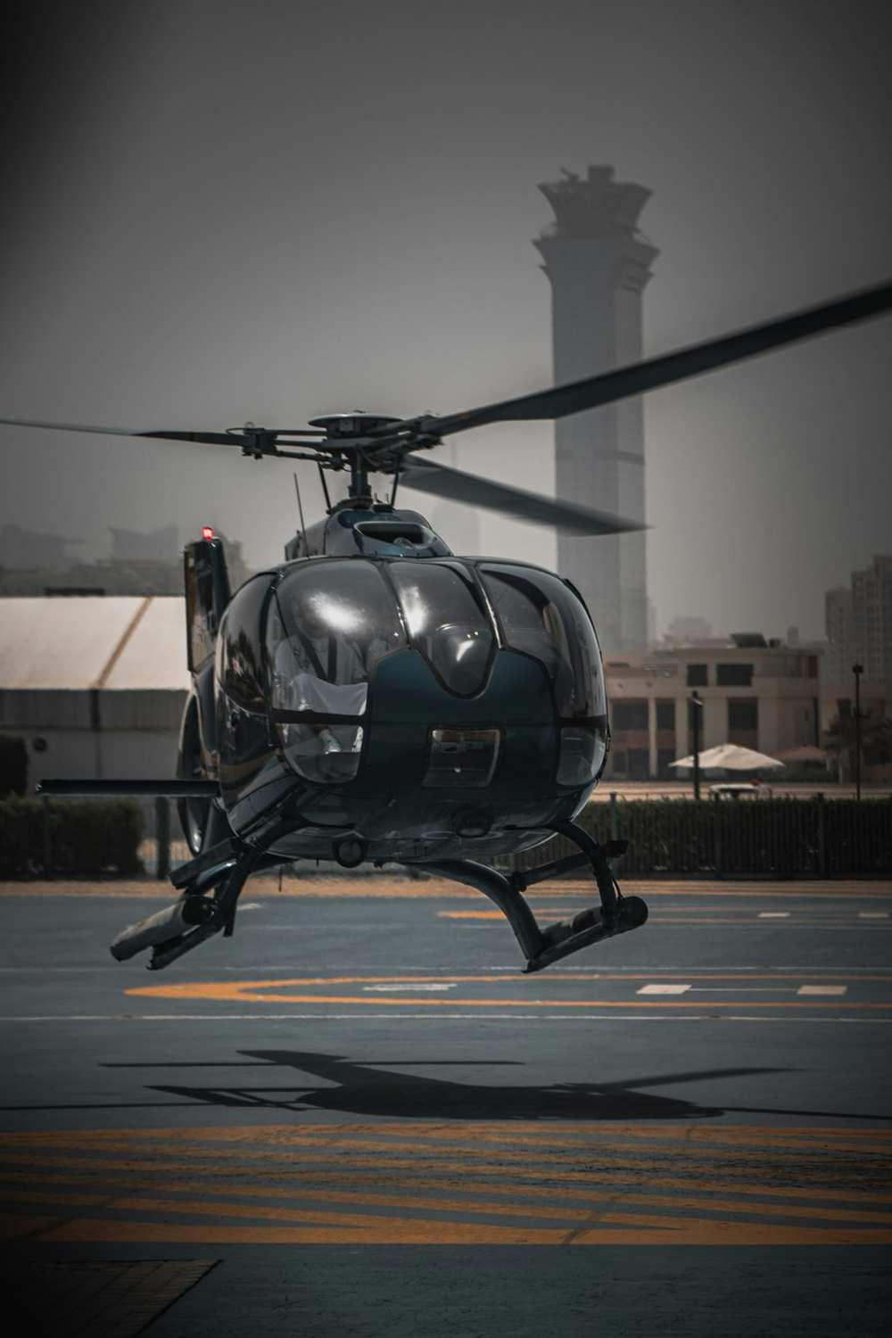A helicopter waiting on the helipad